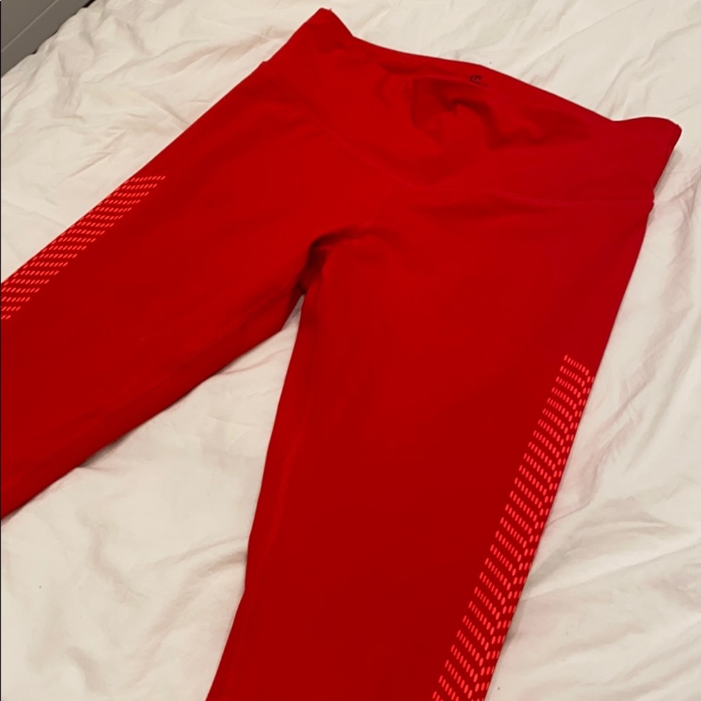 Champion red training legging with side details